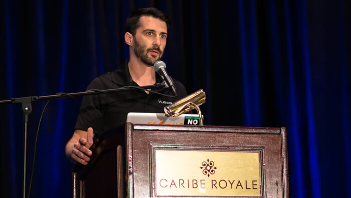 Event Videography of Tyler Markwart speaking during conference at Caribe Royale Hotel in Orlando.