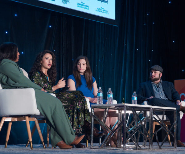 Panel discussion at a professional conference event.