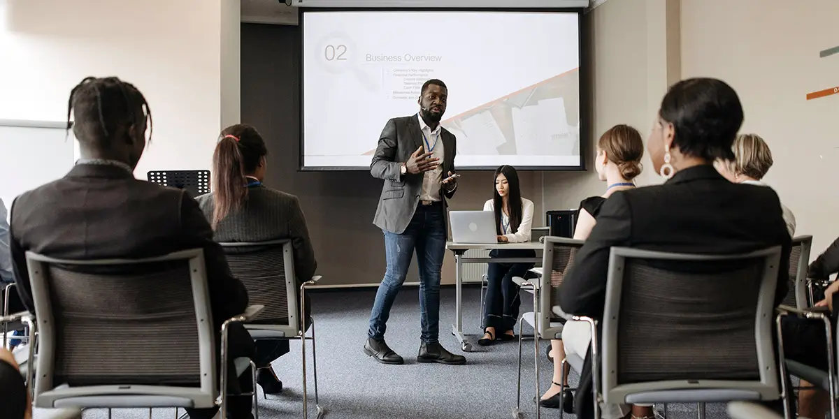 Businessman presenting to colleagues at a seminar