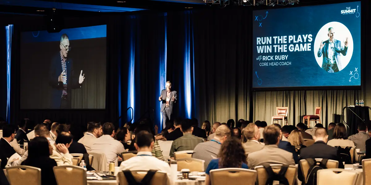 Speaker presenting at a business conference event