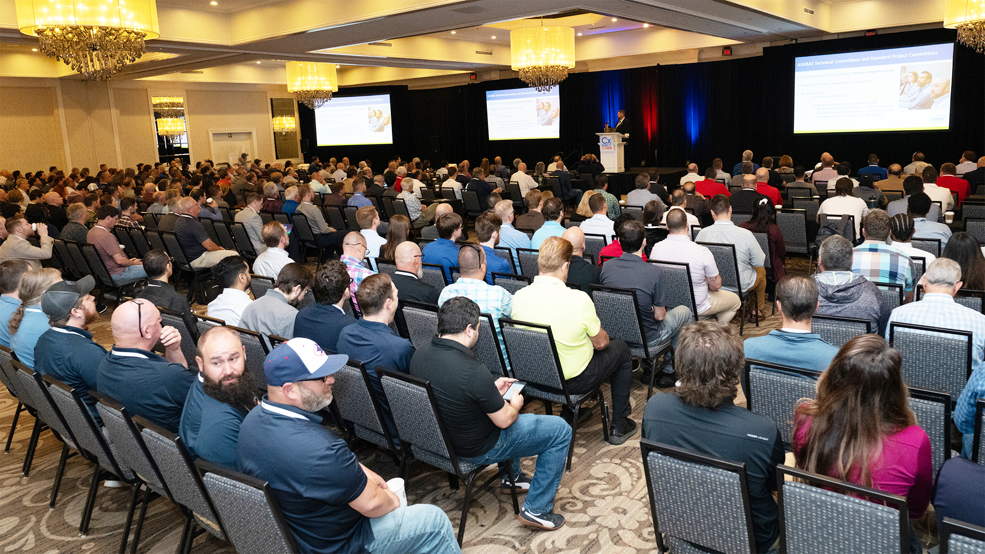 CxEnergy 2025 conference presentation with attendees in Charlotte, North Carolina