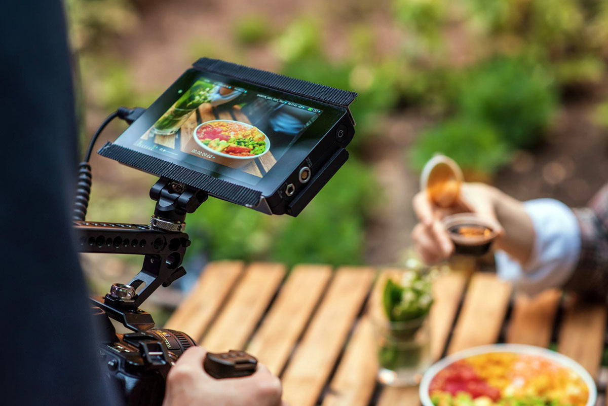 Product videography setup filming food with controlled lighting