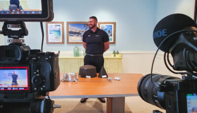 Two cameras filming a presenter during a training demonstration at Margaritaville Resort Orlando.
