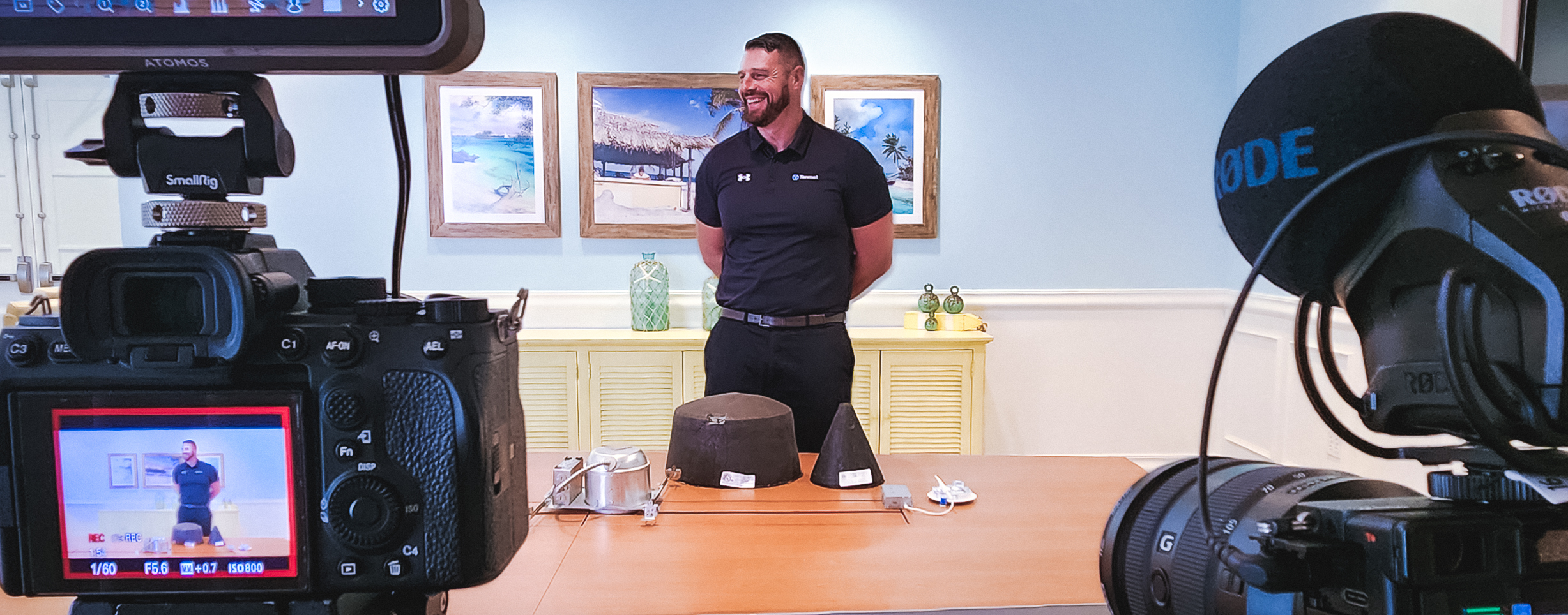 Training video production setup at margaritaville resort orlando with two cameras filming a presenter in a conference room