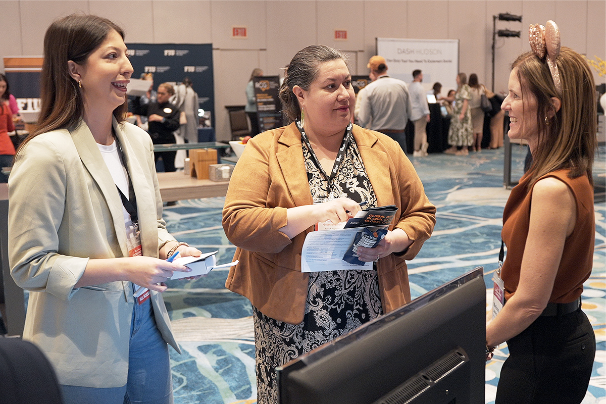 Conference attendees speaking at the walt disney world swan and dolphin resort