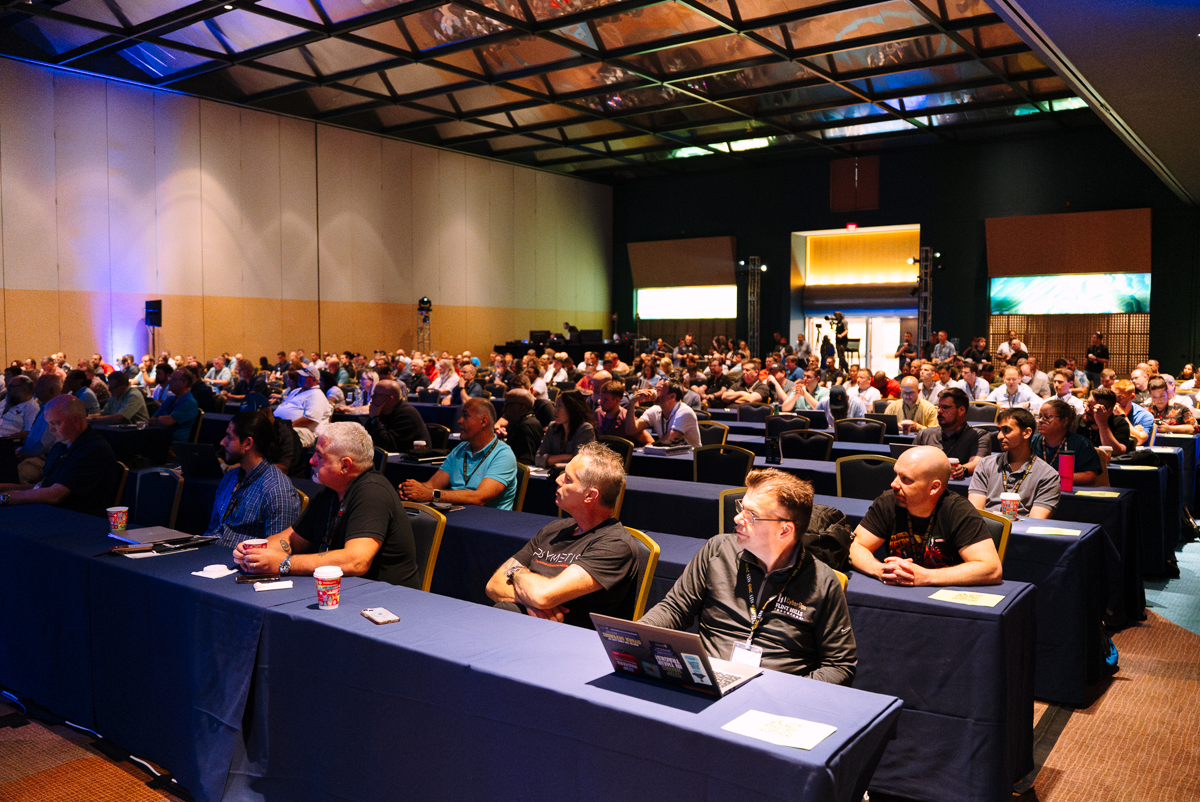 Contemporary resort large conference audience seated during a summit at disney’s contemporary resort
