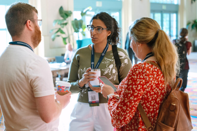 Attendees networking during a summit at disney’s coronado springs resort