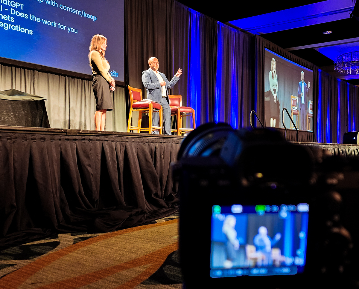 Camera filming an onstage interview at omni orlando resort at championsgate