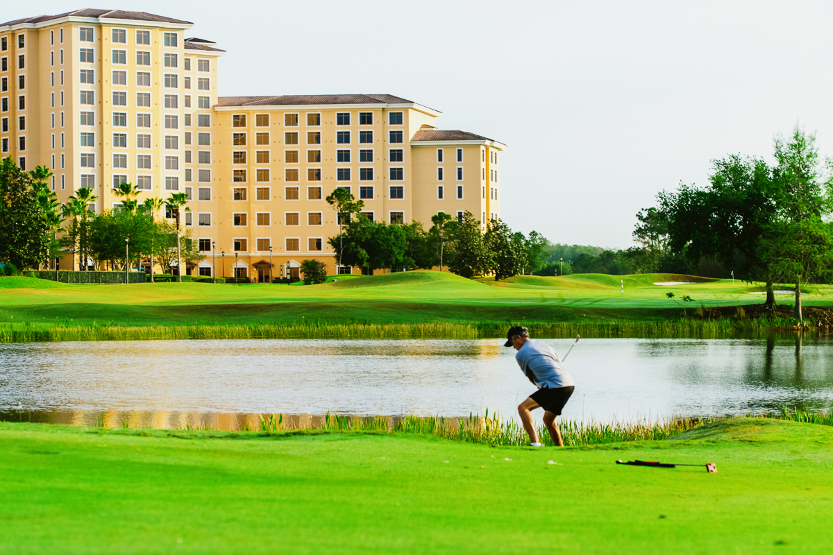 Golfer playing during a golf event at rosen shingle creek in orlando.