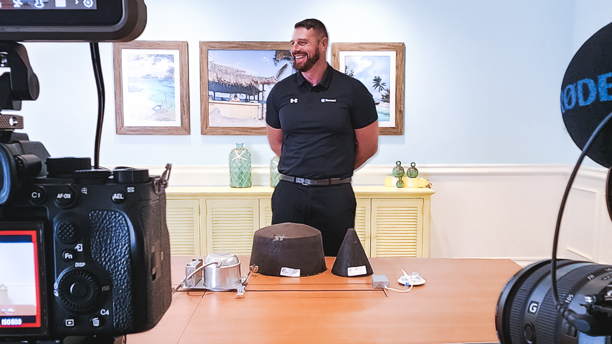Training video production setup at margaritaville resort orlando with two cameras filming a presenter in a conference room